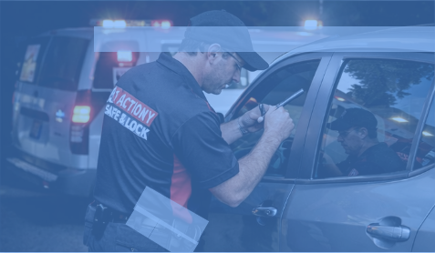 Emergency locksmith helping with a vehicle lockout